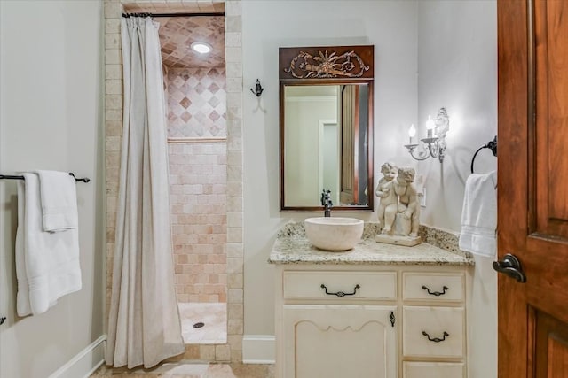 bathroom featuring vanity and a shower with curtain