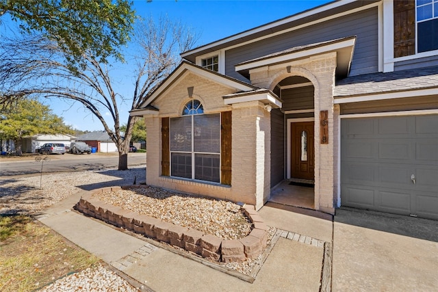 property entrance with a garage