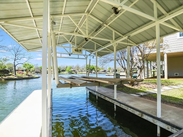 dock area with a water view