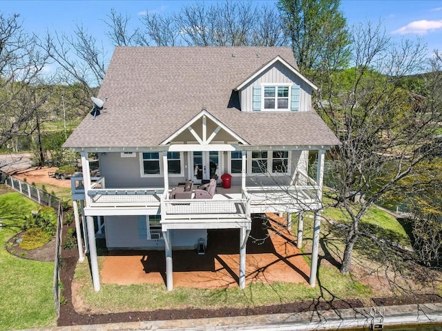 view of front of property with a wooden deck