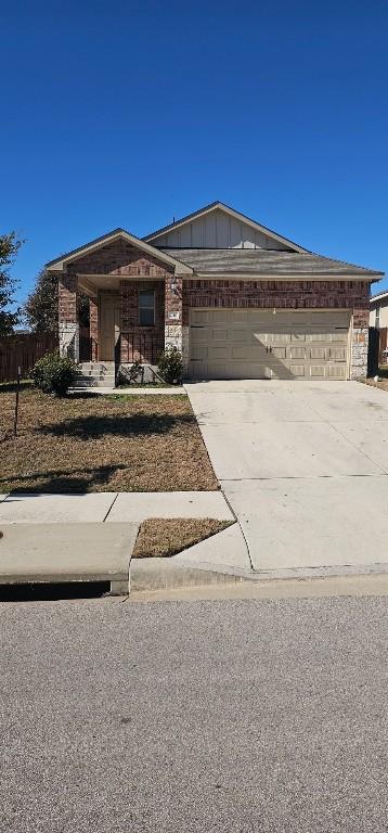 ranch-style home with a garage