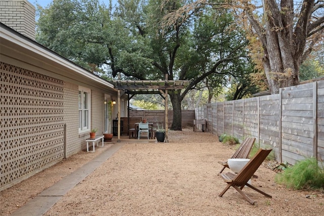 view of yard with a pergola