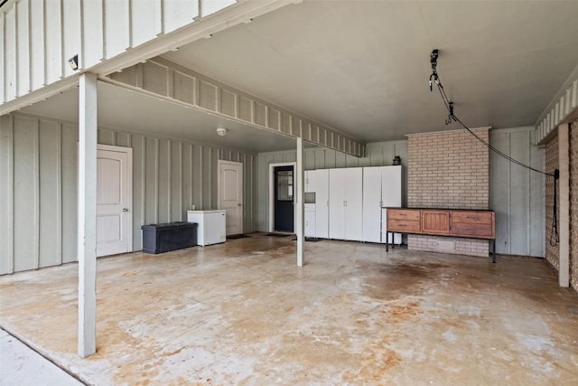 garage featuring fridge