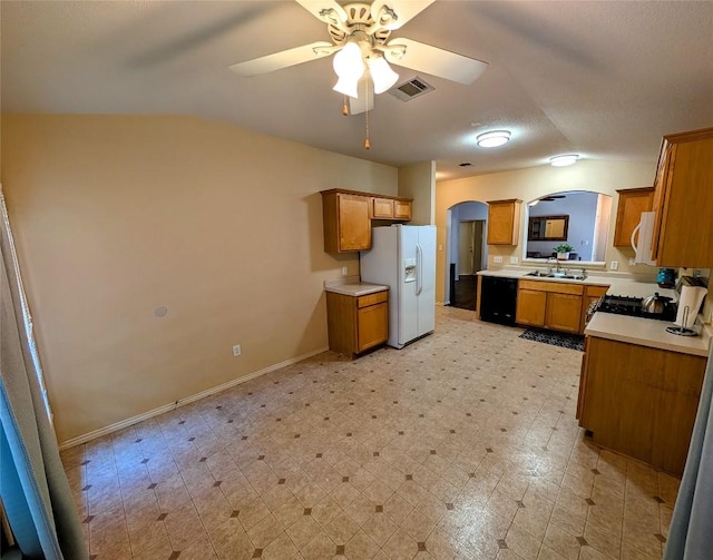 kitchen with ceiling fan, white appliances, and sink