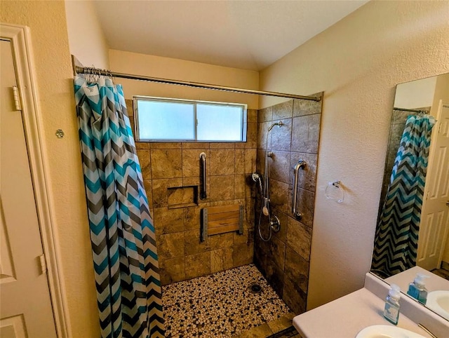 bathroom with a shower with shower curtain