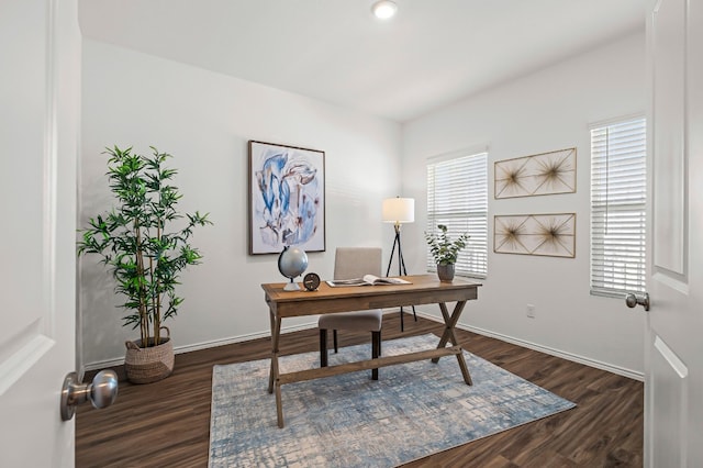 office area with a healthy amount of sunlight and dark hardwood / wood-style floors