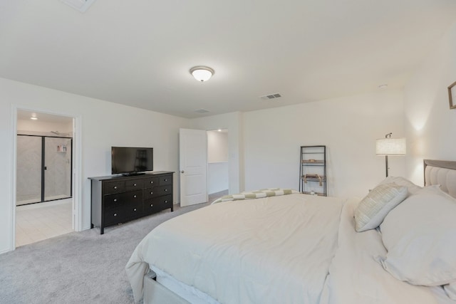 bedroom featuring light colored carpet