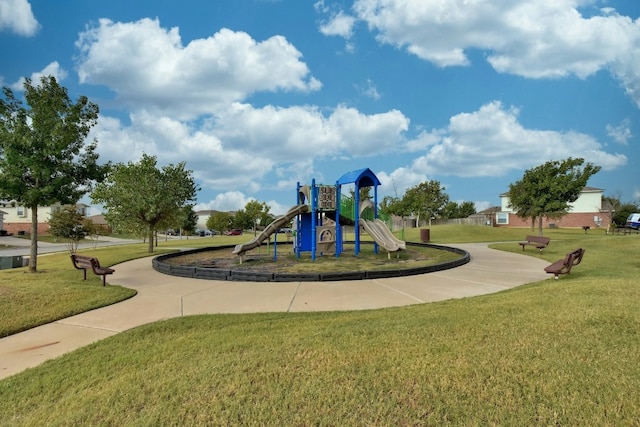 view of playground featuring a lawn