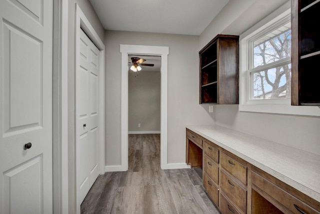 hall with light hardwood / wood-style floors