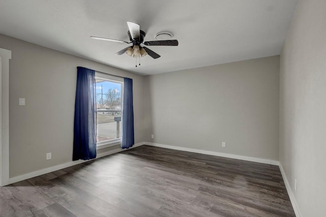 unfurnished room with hardwood / wood-style flooring and ceiling fan