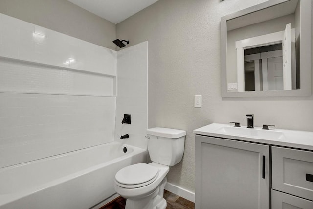 full bathroom featuring vanity, wood-type flooring, shower / bathtub combination, and toilet