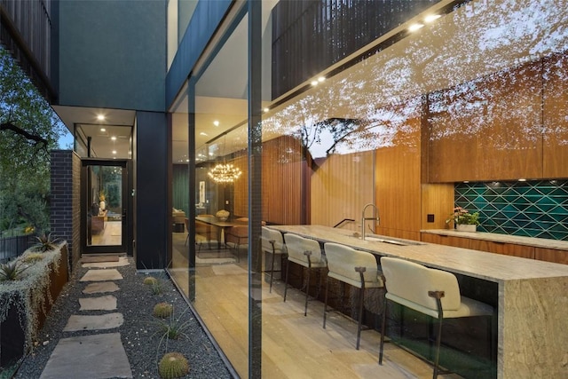 exterior space featuring an outdoor wet bar