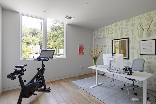 office area with light hardwood / wood-style flooring