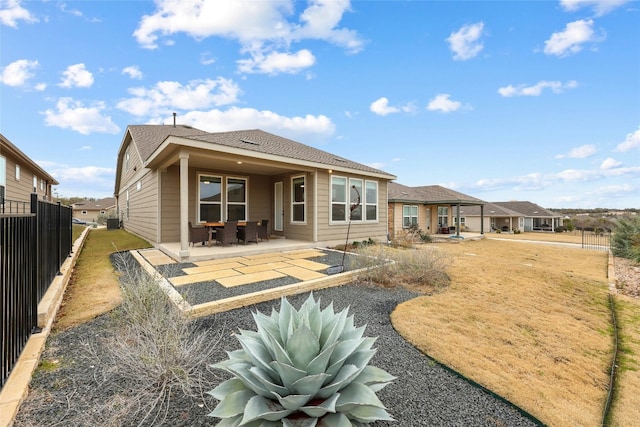 rear view of house featuring a patio area