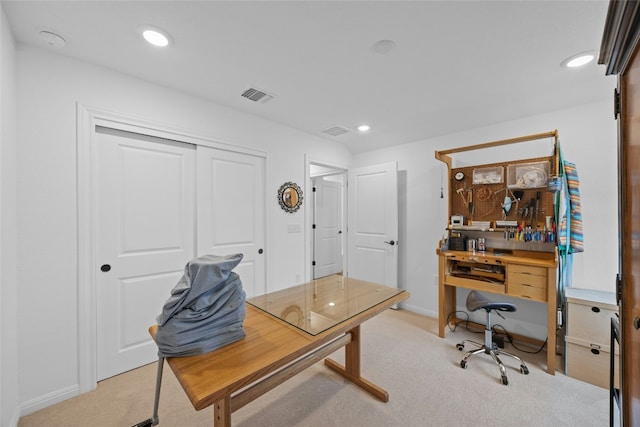 office area featuring light colored carpet