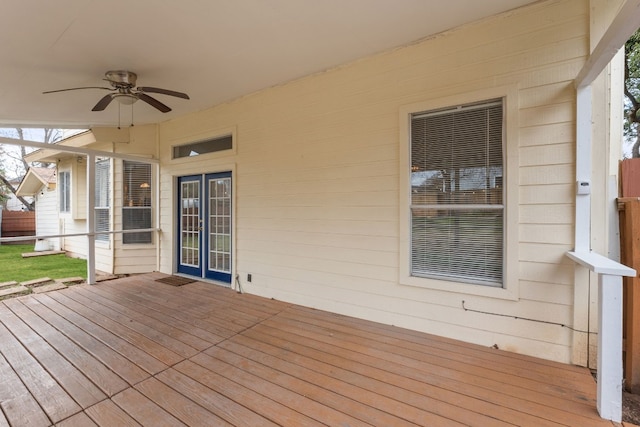 wooden terrace featuring ceiling fan