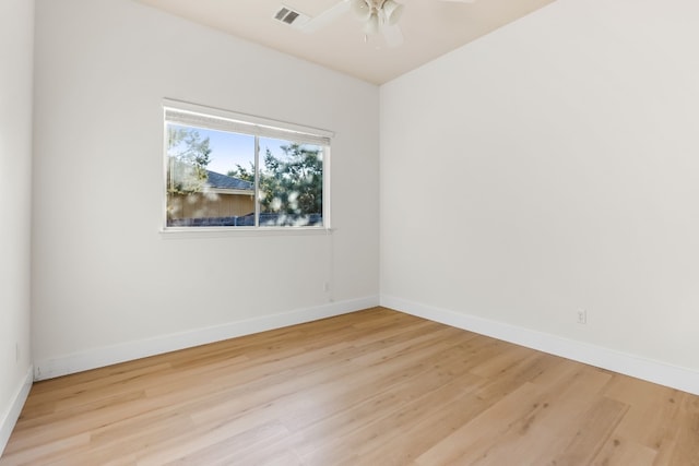 unfurnished room featuring ceiling fan and light hardwood / wood-style floors