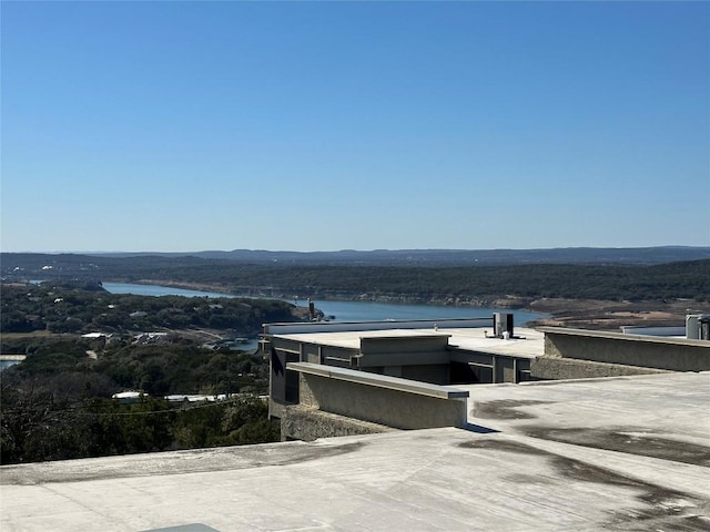 view of patio featuring a water view