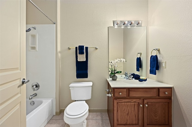 full bathroom with tile patterned floors, toilet, tub / shower combination, and vanity