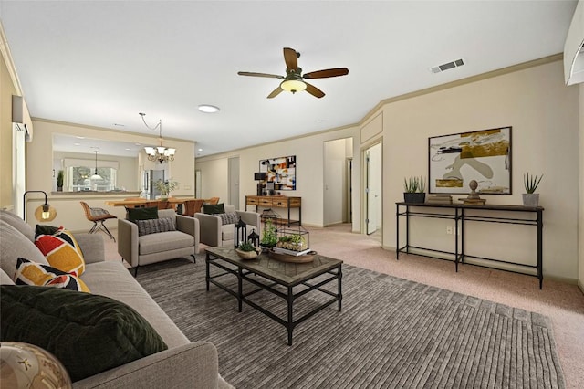 carpeted living room with ornamental molding and ceiling fan with notable chandelier