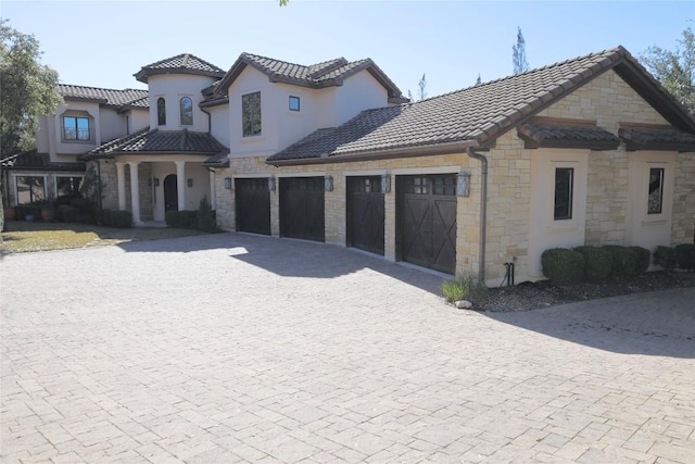 view of front of property with a garage