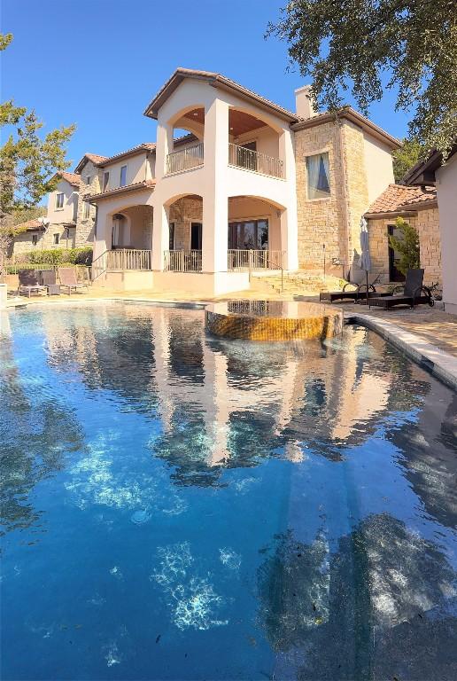 rear view of house featuring a patio