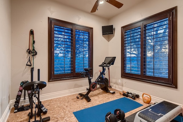 exercise room featuring ceiling fan