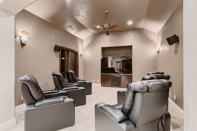 home theater featuring ceiling fan, lofted ceiling, and carpet flooring