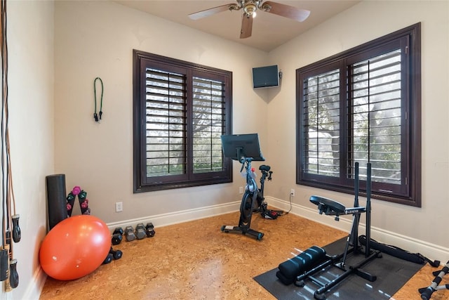 303 Camino Arbolago St, Lakeway, TX 78734 - workout room with a ceiling fan and baseboards