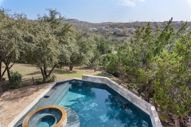 303 Camino Arbolago St, Lakeway, TX 78734 - view of pool with a pool with connected hot tub
