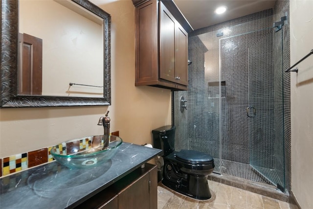 303 Camino Arbolago St, Lakeway, TX 78734 - bathroom featuring a shower stall, vanity, and recessed lighting