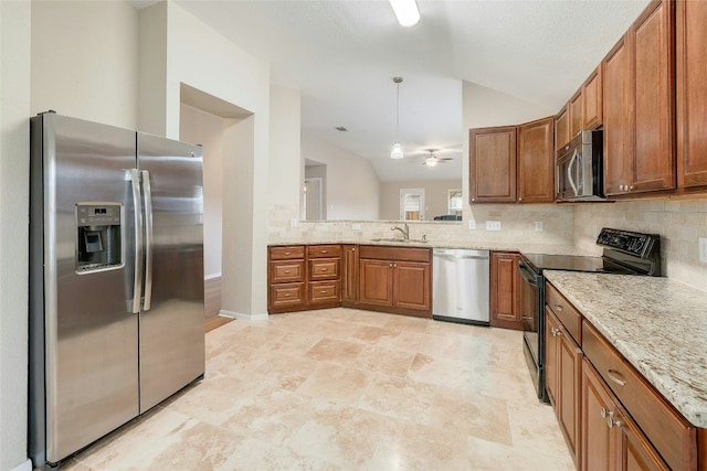 kitchen with lofted ceiling, sink, decorative backsplash, light stone counters, and stainless steel appliances