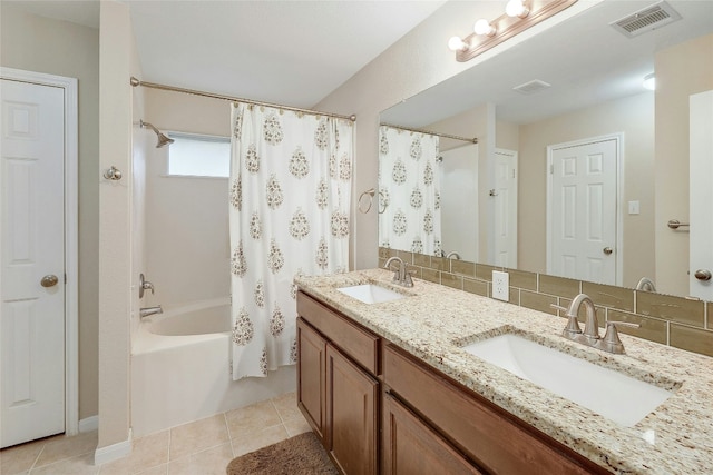 bathroom featuring shower / tub combo, vanity, tile patterned flooring, and decorative backsplash