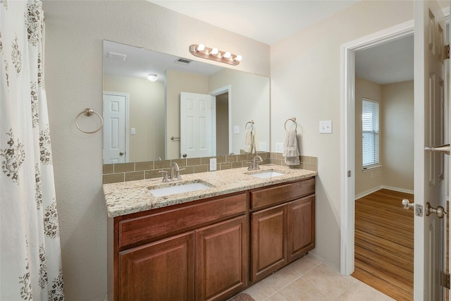 bathroom featuring vanity and tile patterned floors