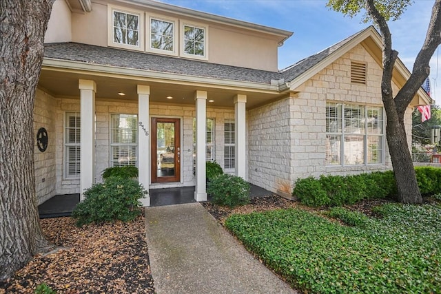 entrance to property with a porch