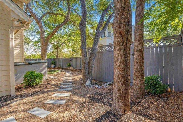 view of yard with a fenced backyard