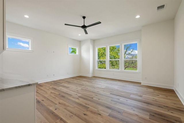 spare room featuring ceiling fan, recessed lighting, visible vents, and light wood-style floors