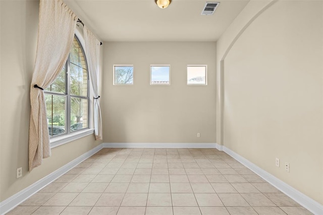 empty room featuring light tile patterned flooring