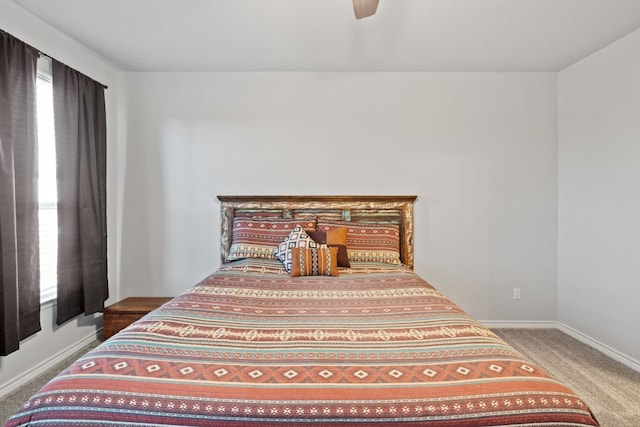 bedroom with ceiling fan and carpet