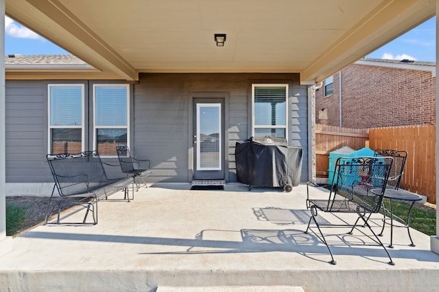 view of patio with a grill