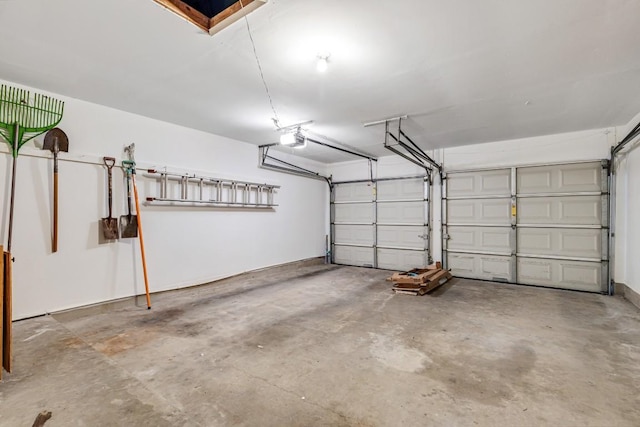 garage featuring a garage door opener