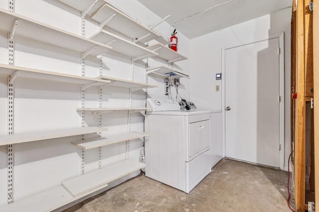 washroom featuring separate washer and dryer