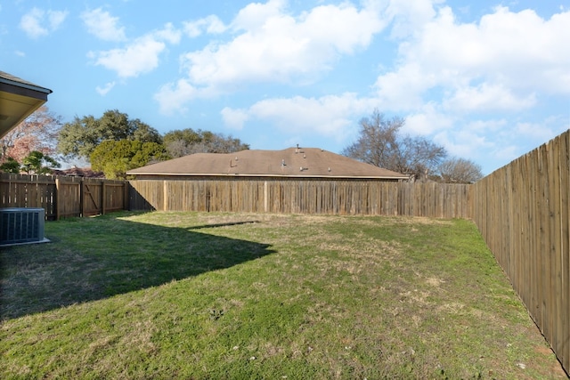 view of yard with central AC