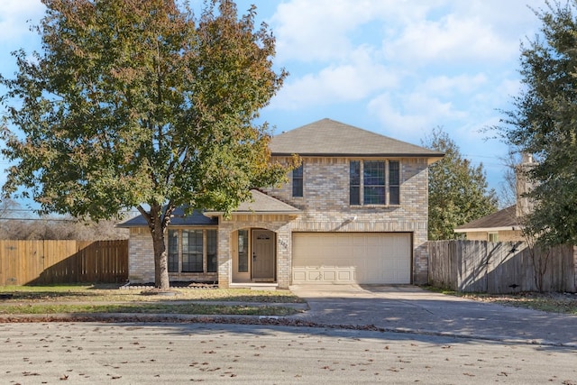 view of front of property featuring a garage