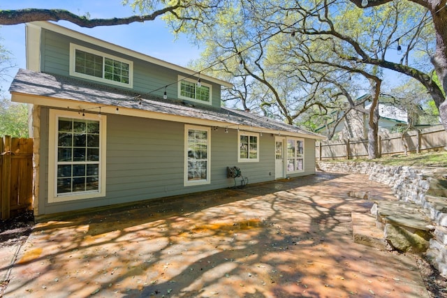 rear view of house featuring a patio