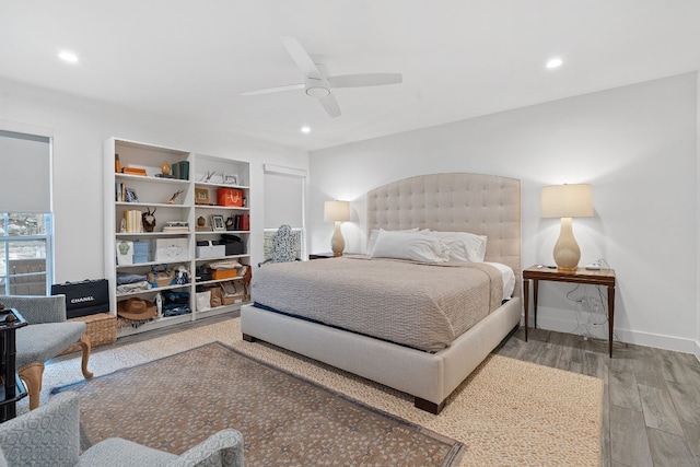 bedroom featuring ceiling fan and light wood-type flooring