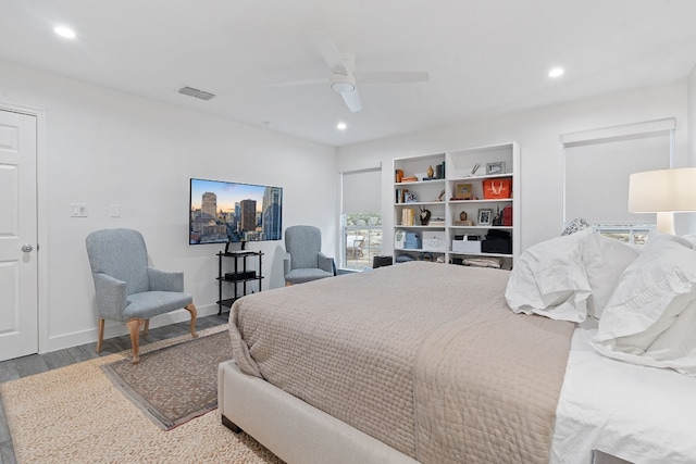 bedroom with hardwood / wood-style flooring and ceiling fan