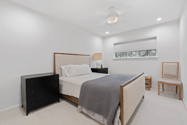 bedroom featuring light colored carpet