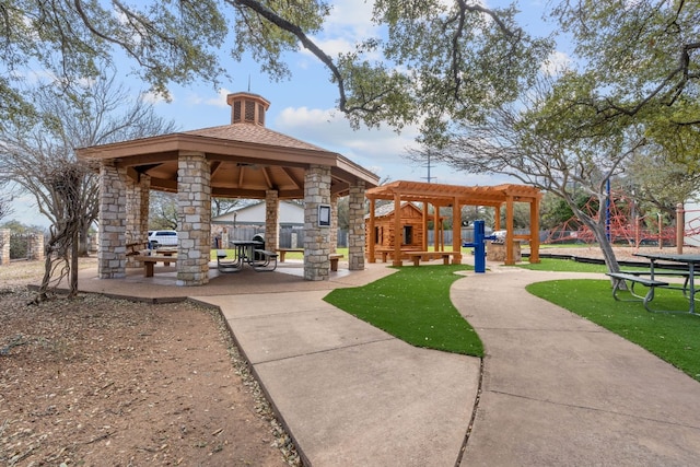 surrounding community with a gazebo, a playground, and a patio