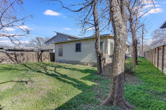 view of home's exterior featuring a yard